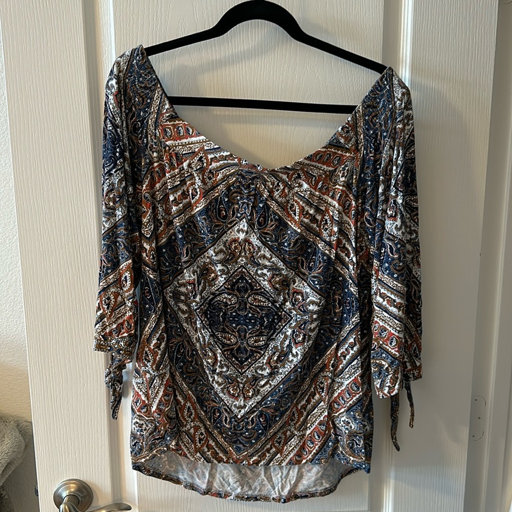 Daniel Rainn off the shoulder top